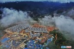 现场图集丨凉山金阳6582人搬新房，彝族绣女绣9.9米长绣品表党恩